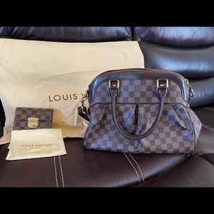 Louis Vuitton purse with matching wallet.
